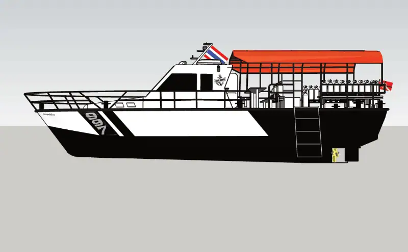 The Pirm Udom Sub dive boat, captured from the side, highlighting its sleek and stable design.