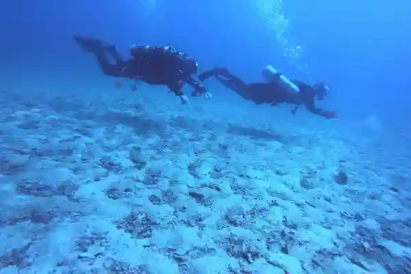 TDI Instructor demonstriert Gaswechseltechniken für Decompression Procedures